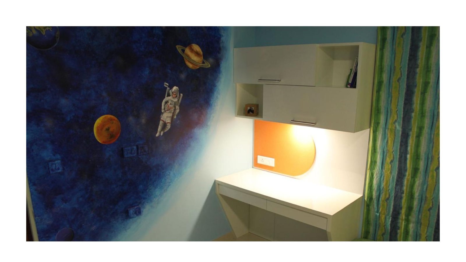 A custom mural of a little astronaut with the child’s own face