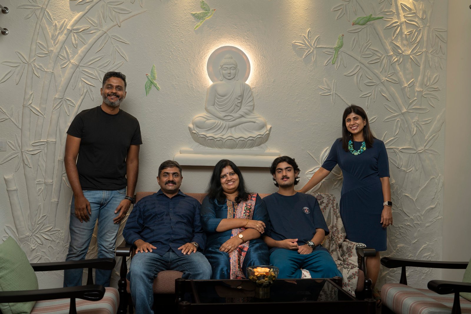 group photo with interior design clients during home handover.