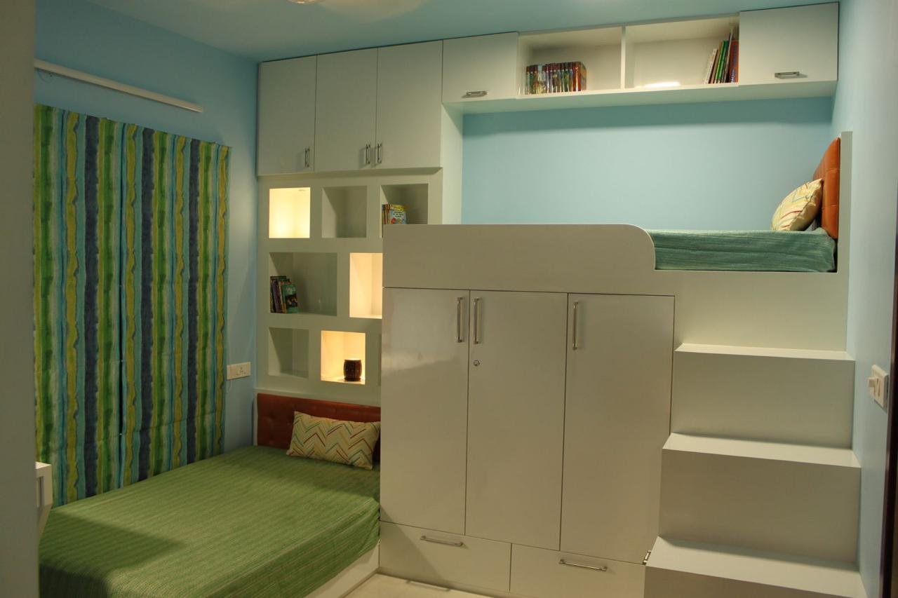 A functional kids bedroom with ample storage.