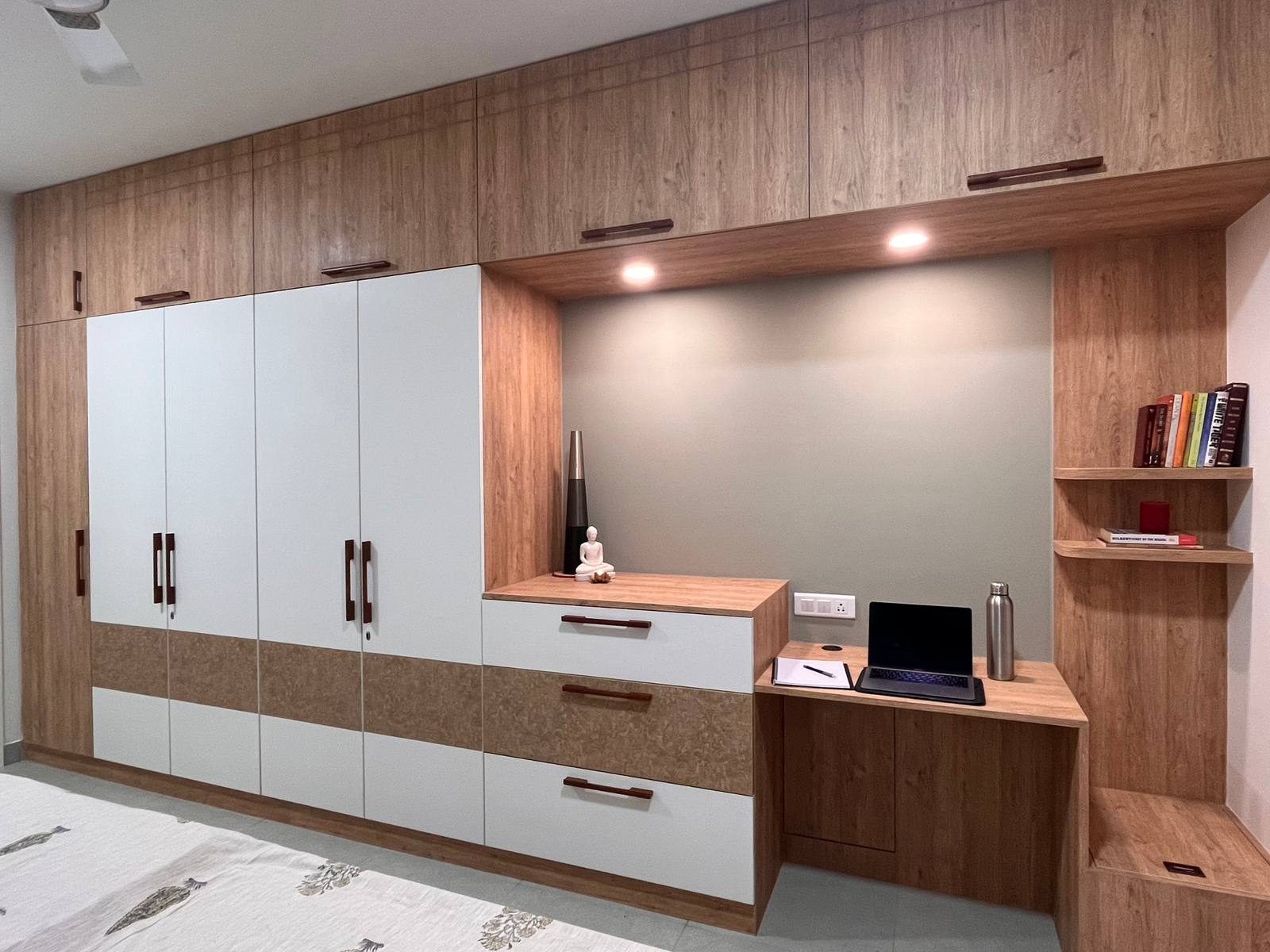Built-in unit includes wardrobes and drawers