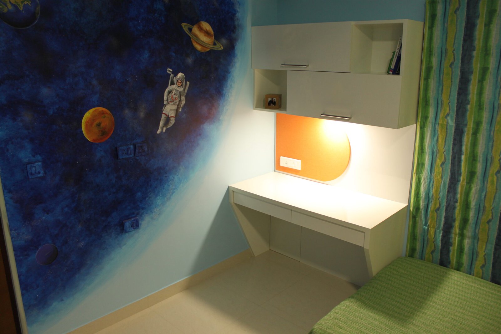 A custom mural with a little astronaut